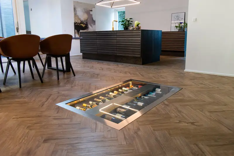 Nedfelt vinkjeller med glasslokk